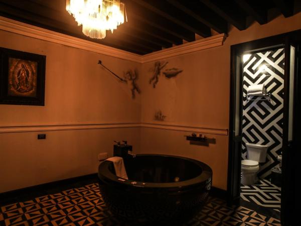 Quinta Esencia : photo 5 de la chambre suite deluxe avec lit king-size