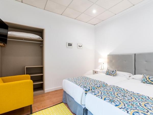 Hotel Sevilla : photo 6 de la chambre chambre lits jumeaux intérieure