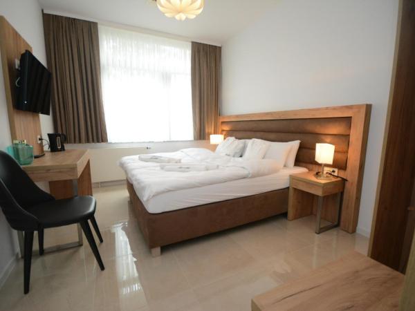 Hannover Zimmervermietung Mardino : photo 4 de la chambre chambre double ou lits jumeaux avec douche