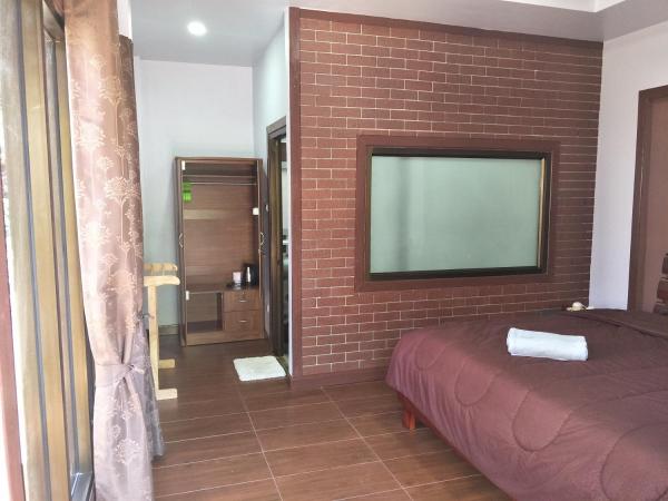 Lanta Fa Rung Beach Resort : photo 6 de la chambre cottage avec climatisation - vue sur jardin