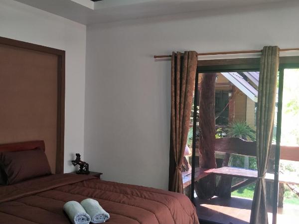 Lanta Fa Rung Beach Resort : photo 9 de la chambre cottage avec climatisation - vue sur jardin