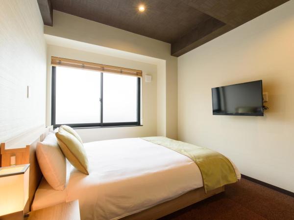 JP INN Kyoto Ekimae Mongakucho : photo 5 de la chambre chambre lit queen-size