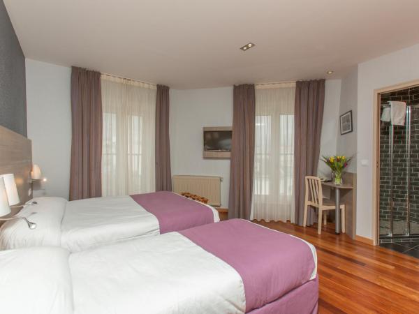 Grand Hotel du Loiret : photo 3 de la chambre chambre triple