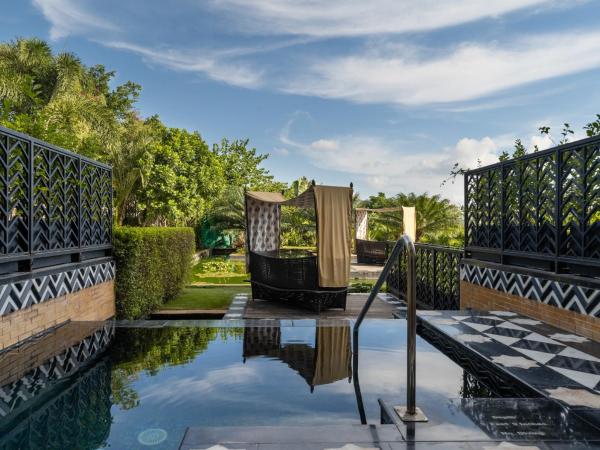 The Leela Palace Udaipur : photo 4 de la chambre chambre grand heritage avec piscine privée - vue sur jardin