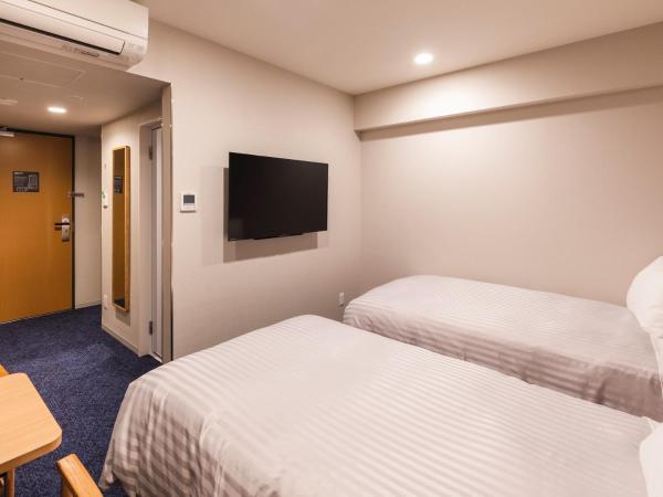 Sotetsu Fresa Inn Nagoya-Shinkansenguchi : photo 2 de la chambre hébergement lits jumeaux de luxe - non-fumeurs