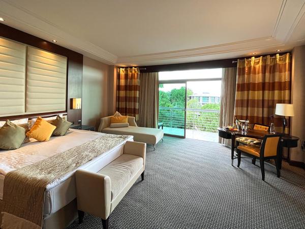 Calista Luxury Resort : photo 1 de la chambre chambre supérieure - vue sur jardin