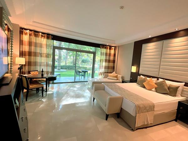 Calista Luxury Resort : photo 4 de la chambre chambre supérieure - vue sur jardin