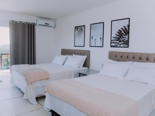 Pousada Peninsula de Buzios : photo 8 de la chambre chambre quadruple - vue sur mer