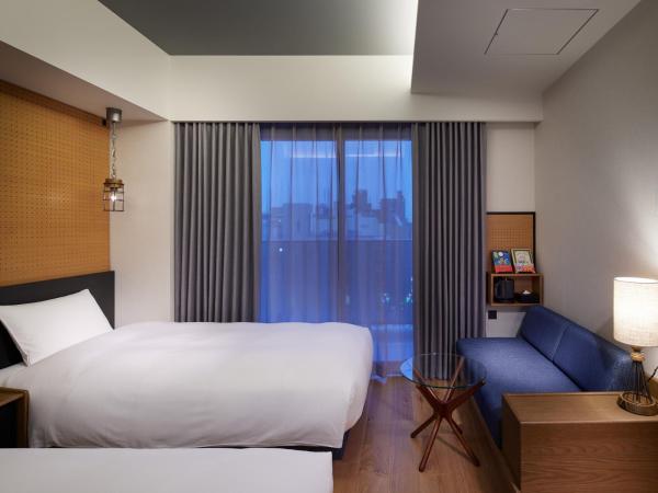 LAMP LIGHT BOOKS HOTEL fukuoka : photo 4 de la chambre chambre lits jumeaux moyenne