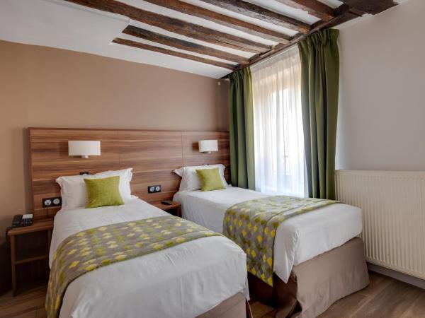 Hotel Chabrol Opera : photo 1 de la chambre chambre lits jumeaux