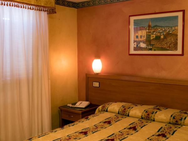Hotel Joli : photo 1 de la chambre chambre simple