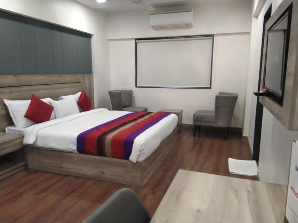 HOTEL INDUS INN : photo 1 de la chambre suite