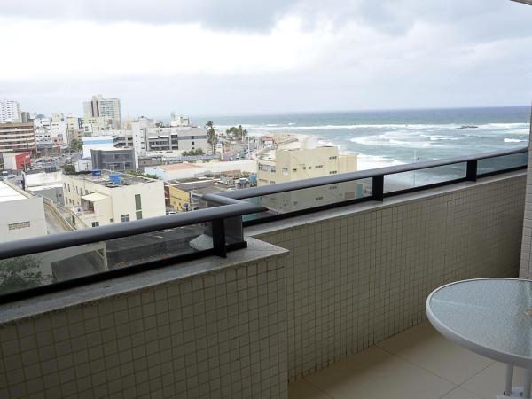 Pituba Praiamar Hotel : photo 1 de la chambre suite lit king-size avec baignoire spa