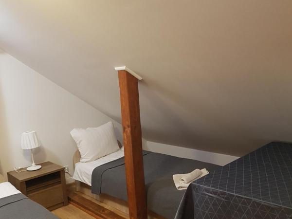 Hostel Mleczna - Metro Zacisze : photo 3 de la chambre chambre quadruple avec salle de bains commune