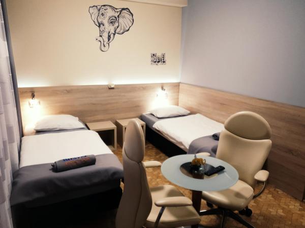 Biały Słoń : photo 1 de la chambre chambre triple avec salle de bains privative