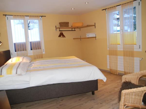 Hotel Lauberhorn - Home for Outdoor Activities : photo 2 de la chambre chambre double lifestyle avec balcon