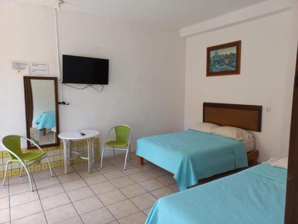 Airport Sleepy Inn : photo 6 de la chambre chambre 2 lits king-size