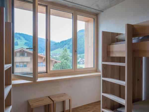 Gstaad Saanenland Youth Hostel : photo 3 de la chambre lit simple dans chambre quadruple