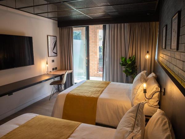 FULTON Business Luxury HOTEL : photo 3 de la chambre chambre lits jumeaux avec terrasse