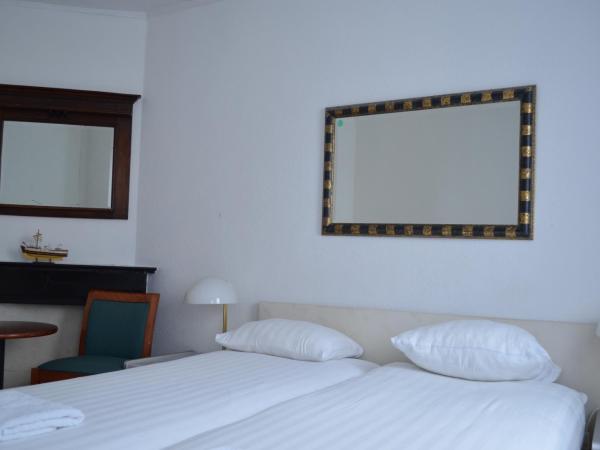 Hotel de Munck : photo 4 de la chambre chambre triple avec salle de bains privative