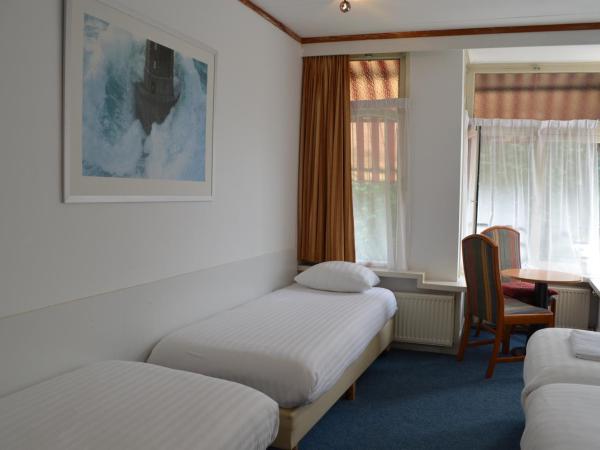Hotel de Munck : photo 1 de la chambre chambre quadruple avec salle de bains privative