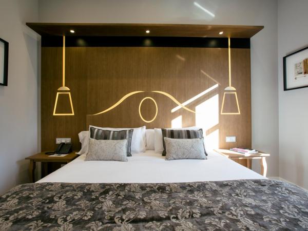 Legazpi Doce Rooms & Suites : photo 3 de la chambre studio 2 chambres avec balcon