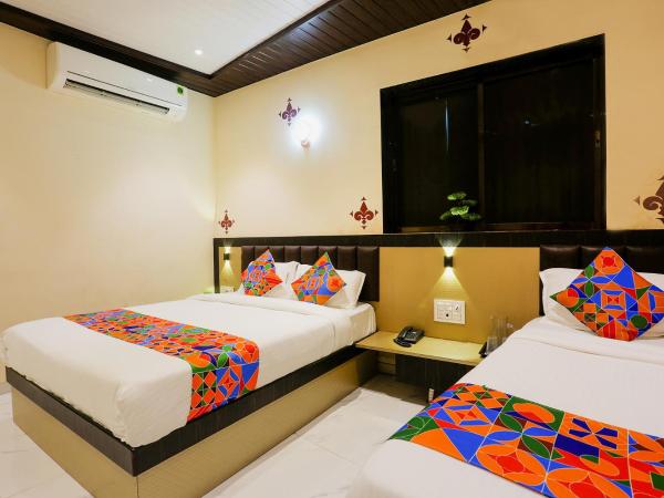 FabExpress Prime Land : photo 1 de la chambre chambre familiale