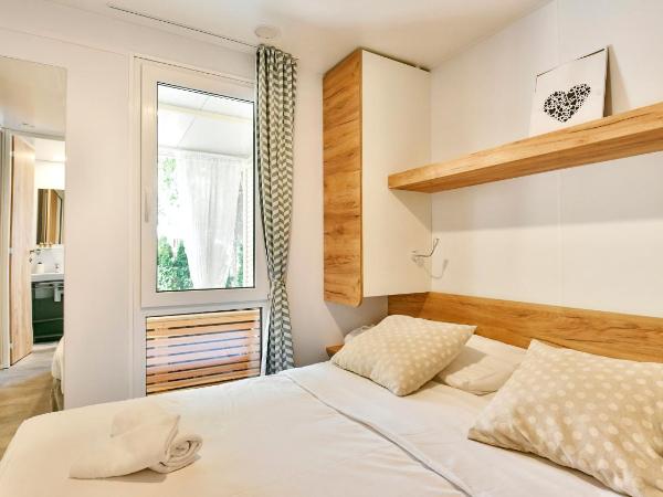 Polidor Camping Resort : photo 10 de la chambre mobile home 2 chambres deluxe avec jacuzzi