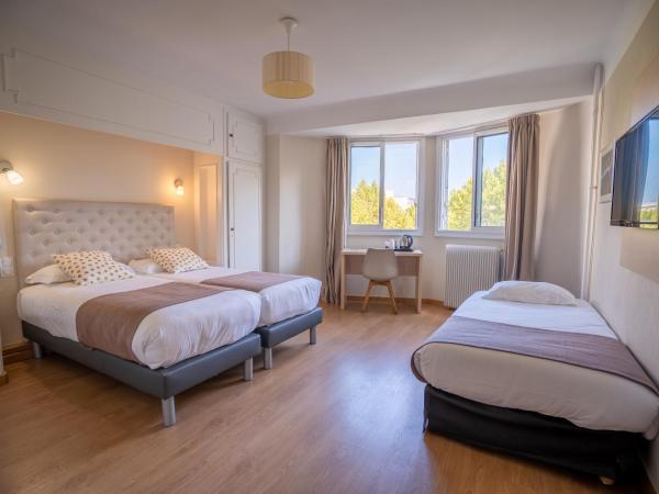 Hôtel Mondial : photo 2 de la chambre chambre triple