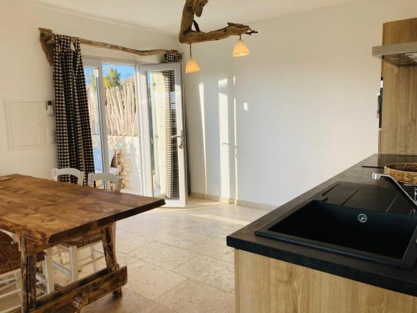 Manade des Baumelles : photo 2 de la chambre appartement avec terrasse