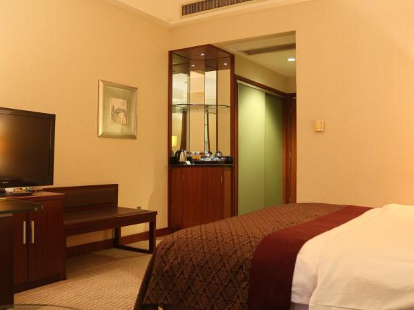 Jinling Jingyuan Plaza : photo 2 de la chambre chambre double deluxe (2 adultes + 1 enfant)