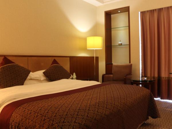 Jinling Jingyuan Plaza : photo 3 de la chambre chambre double deluxe (2 adultes + 1 enfant)