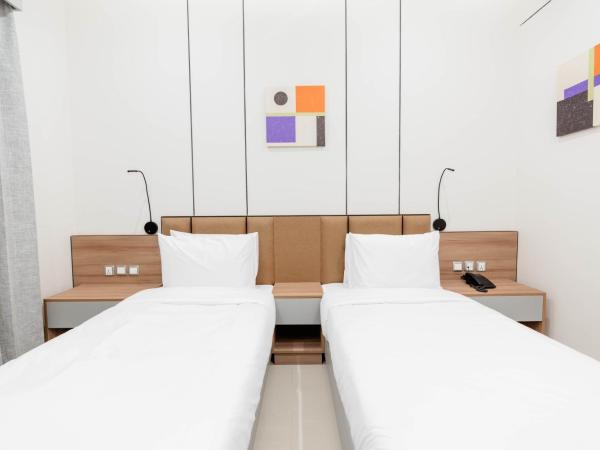 Resivation Hotel : photo 2 de la chambre chambre lits jumeaux supérieure