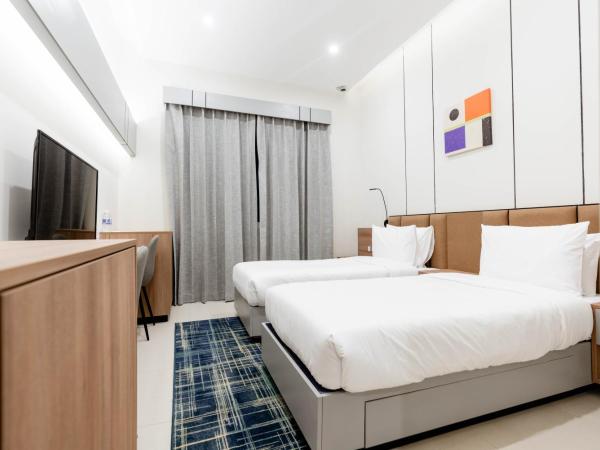 Resivation Hotel : photo 4 de la chambre chambre lits jumeaux supérieure