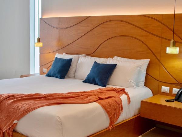 Hotel Puerto Libre : photo 8 de la chambre chambre lit king-size supérieure