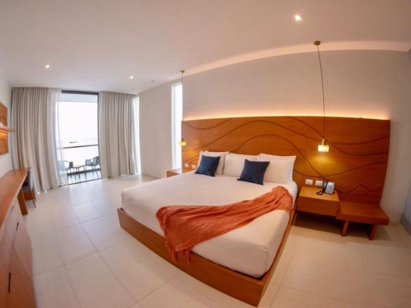 Hotel Puerto Libre : photo 5 de la chambre chambre lit king-size supérieure