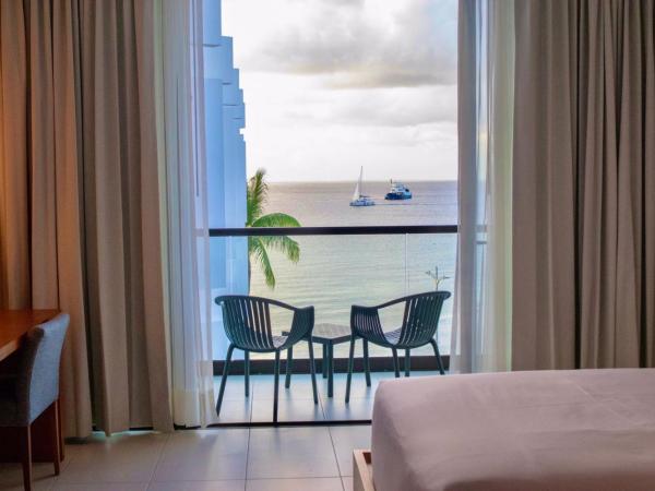 Hotel Puerto Libre : photo 1 de la chambre chambre lit king-size supérieure