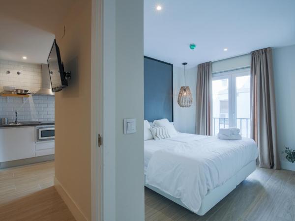 Apartamentos Magna Sevilla : photo 10 de la chambre suite 1 chambre