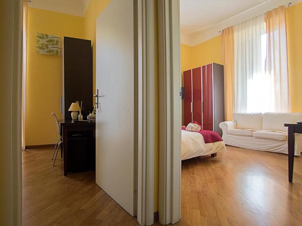 Residenza Viani Guest House : photo 1 de la chambre suite familiale