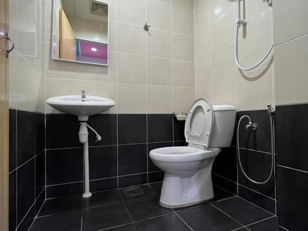 Cassia Inn Kuching : photo 7 de la chambre chambre lit queen-size deluxe