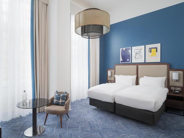 voco Grand Central Glasgow, an IHG Hotel : photo 1 de la chambre chambre lits jumeaux premium