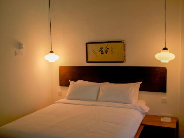 Ren I Tang Heritage Inn : photo 1 de la chambre chambre puits aérien