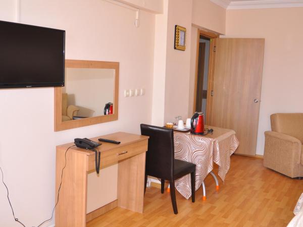 Emsa Otel Maltepedeki Eviniz : photo 2 de la chambre chambre triple standard avec balcon