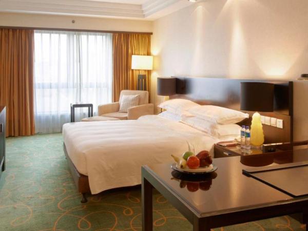 Guo Ji Yi Yuan Hotel : photo 2 de la chambre chambre double ou lits jumeaux exécutive