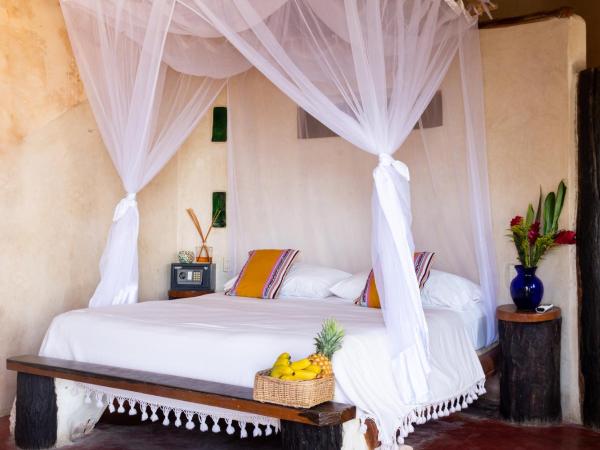 La Posada del Sol Boutique Hotel Tulum : photo 9 de la chambre suite lit king-size principale - côté océan