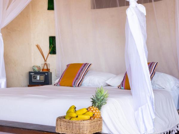 La Posada del Sol Boutique Hotel Tulum : photo 4 de la chambre suite lit king-size principale - côté océan