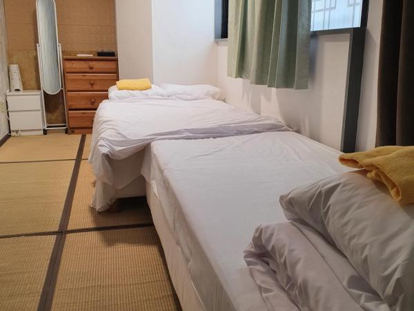 Shinjuku Sky hostel : photo 4 de la chambre chambre triple Économique