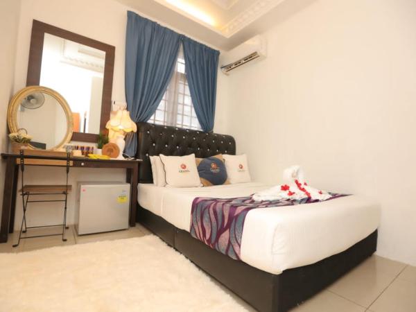 Ghazrins Garuda JB : photo 1 de la chambre chambre double