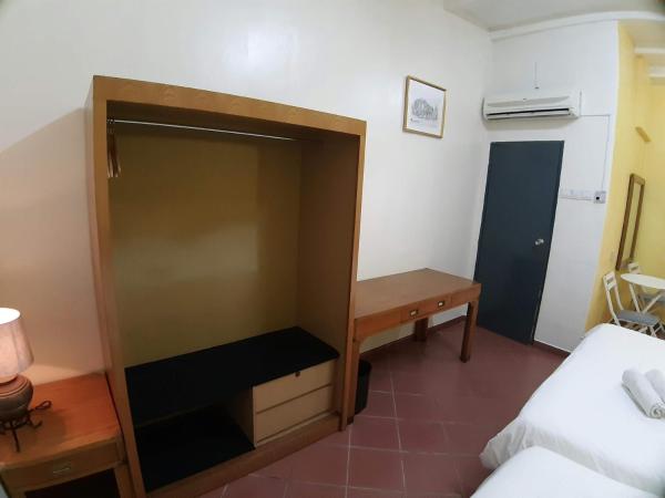 Heeren Inn Melaka : photo 4 de la chambre chambre familiale - vue sur jardin