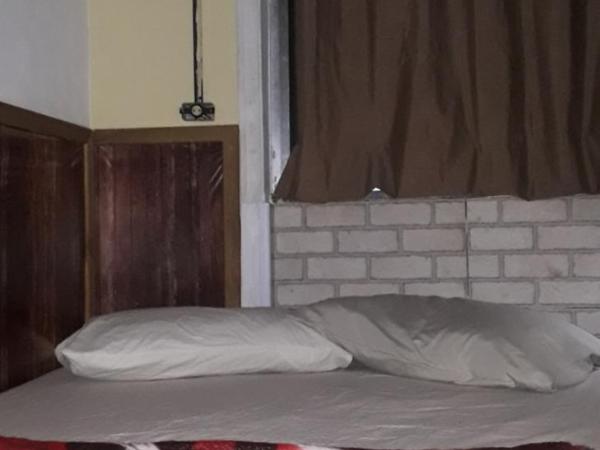 Hostel Sapucali : photo 1 de la chambre suite familiale